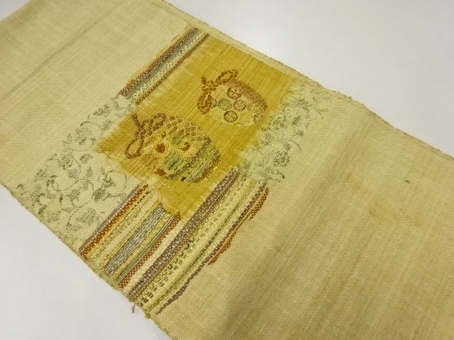 アンティーク　手織り真綿紬仕覆に花唐草模様織出し名古屋帯